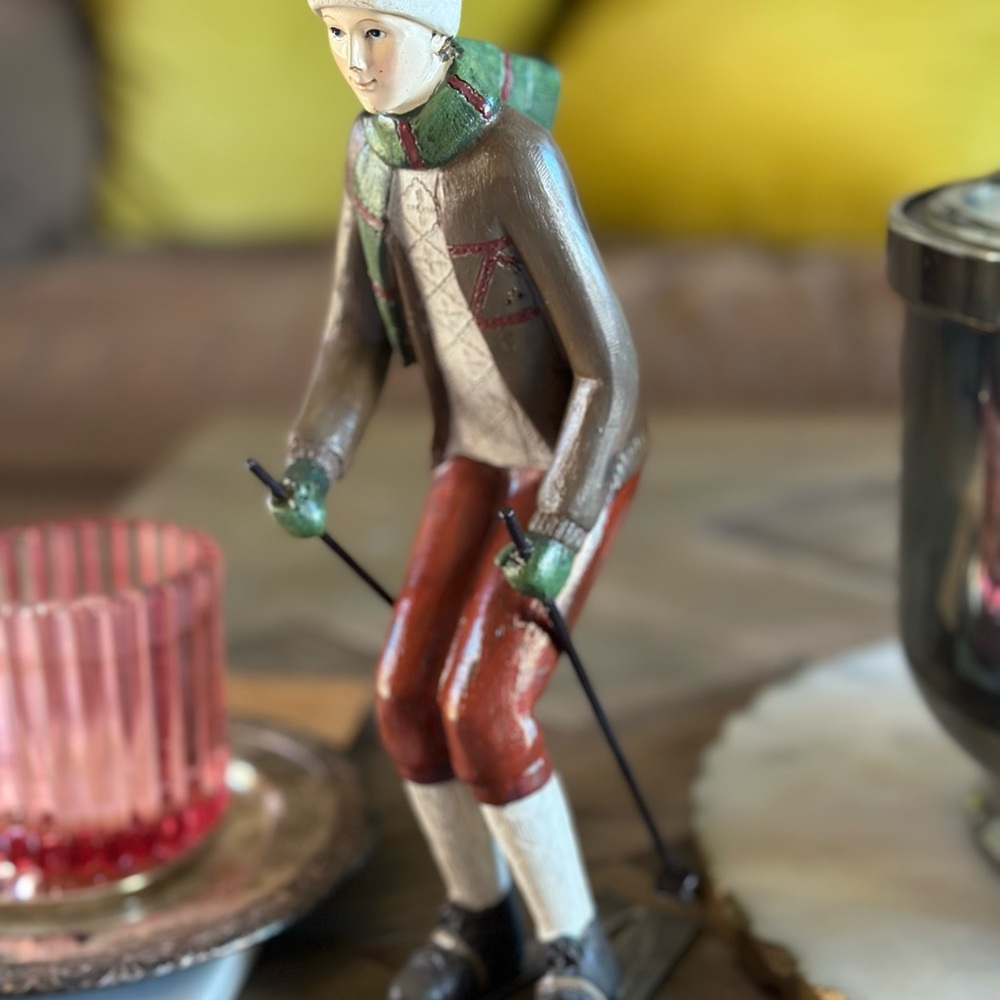 Vintage Skiing Figurine with Red and Green Accents